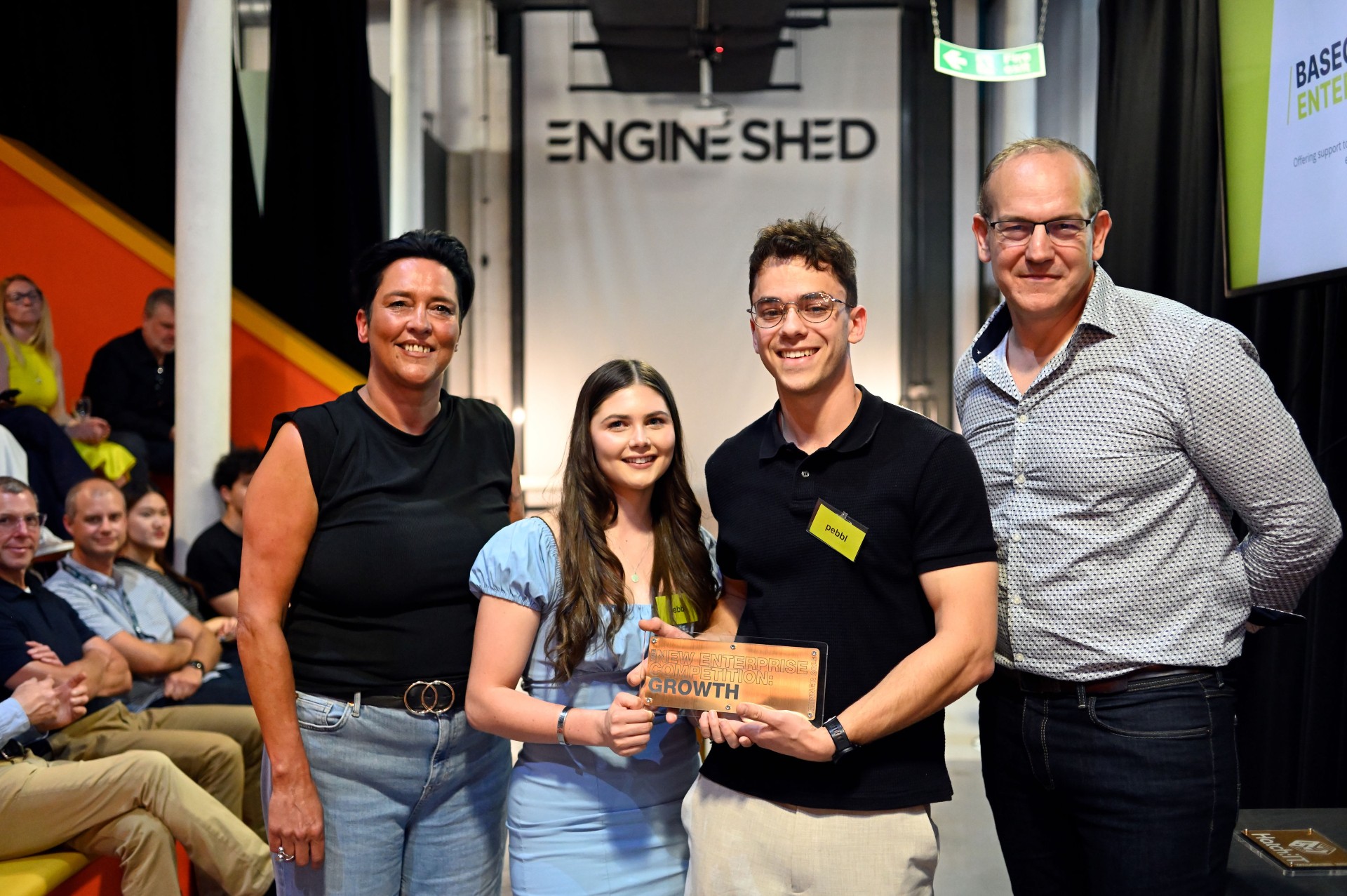 New Enterprise Winner_2024_25_Pebbl_Slant co-founders Holly Brown (middle- left) and Arik Shukhman (middle-right) receiving award